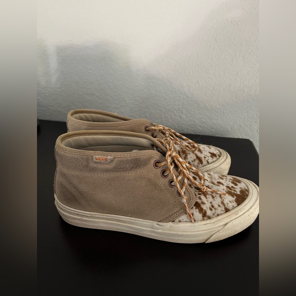 Vans mid top cow print sneakers